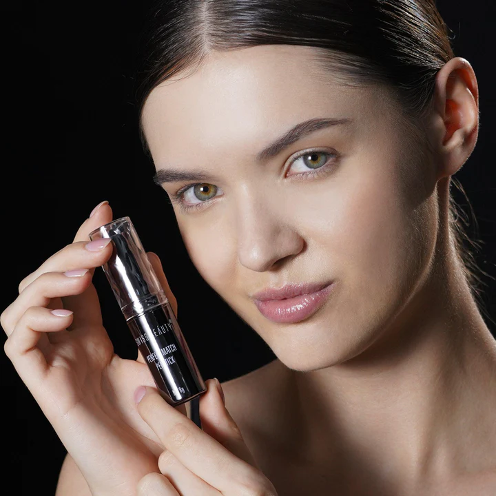 women holding swiss beauty panstick