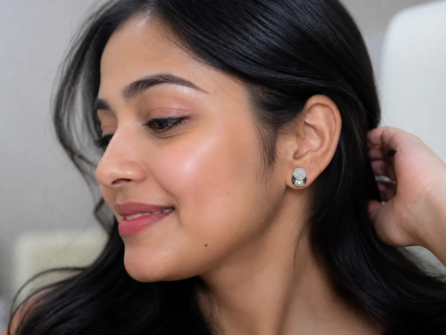 Modern pearl and rhinestone cluster earrings in a silver plated circular setting for women